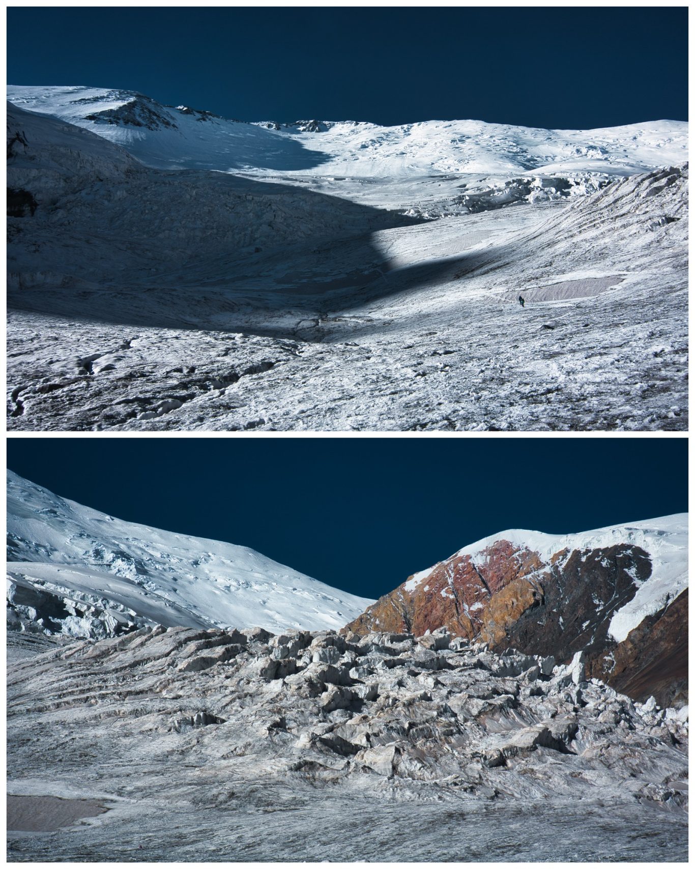 Aufstieg in Camp 1 am Pik Lenin Schneebedeckte Berglandschaft mit felsigen Hängen und klarem Himmel.